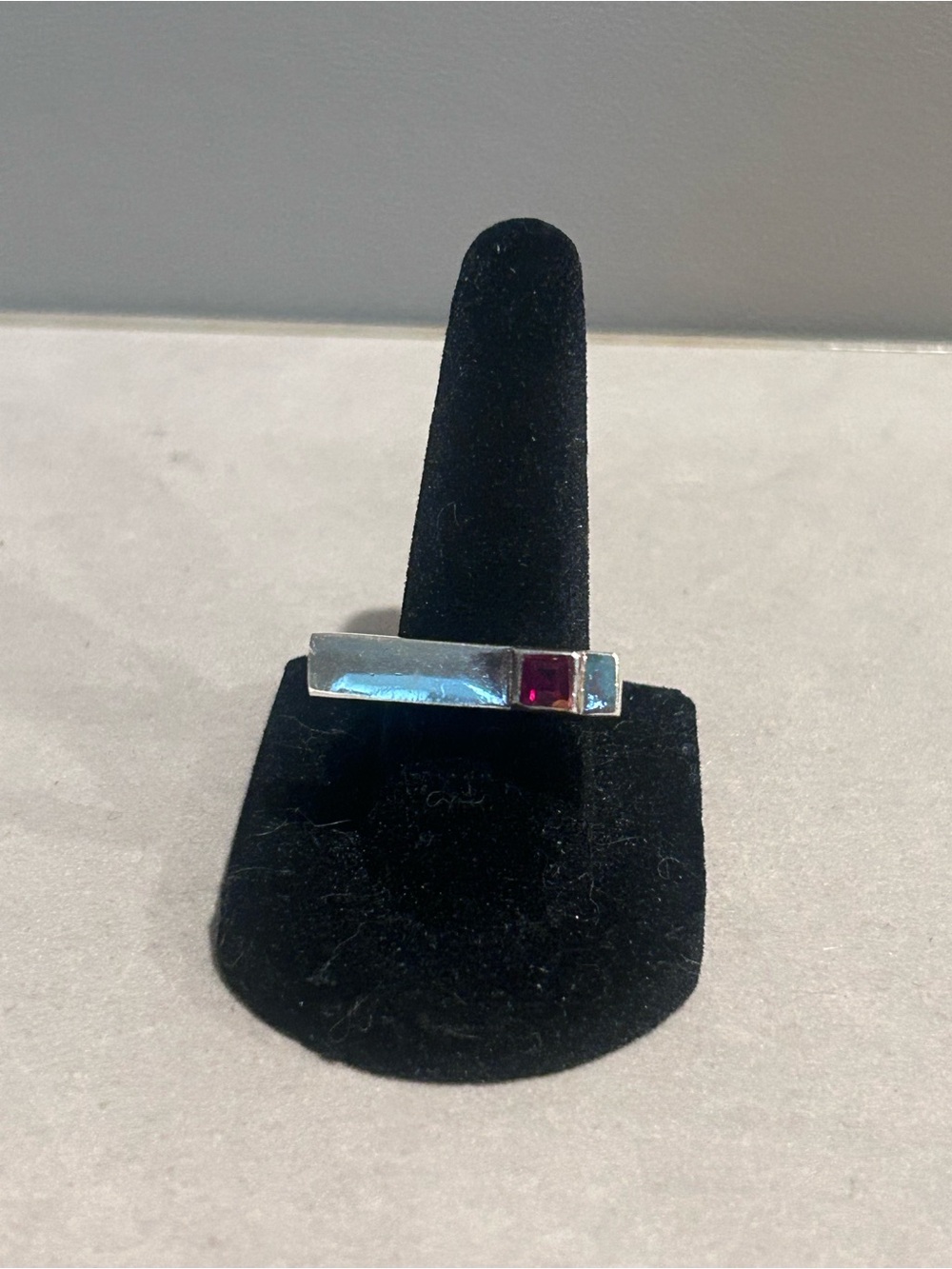 Sidney Carter Modern Bar Ring with Red Stone